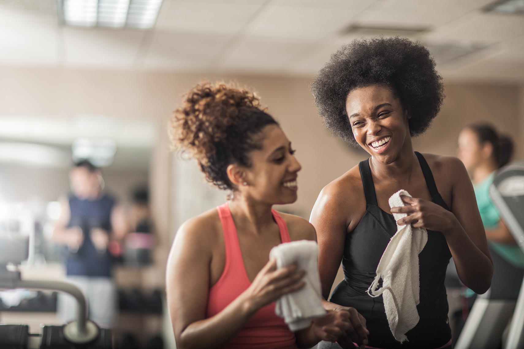 Friends laughing after a work out. | John Fedele Lifestyle Photography
