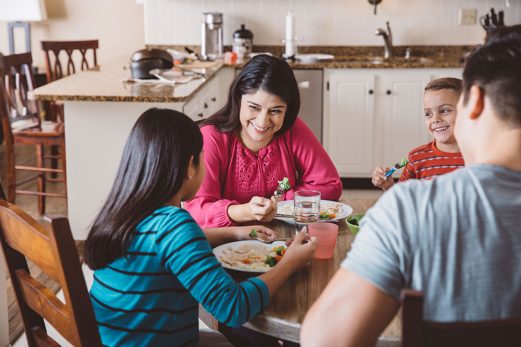 Family eating dinner |  Centene | John Fedele Lifestyle Photography