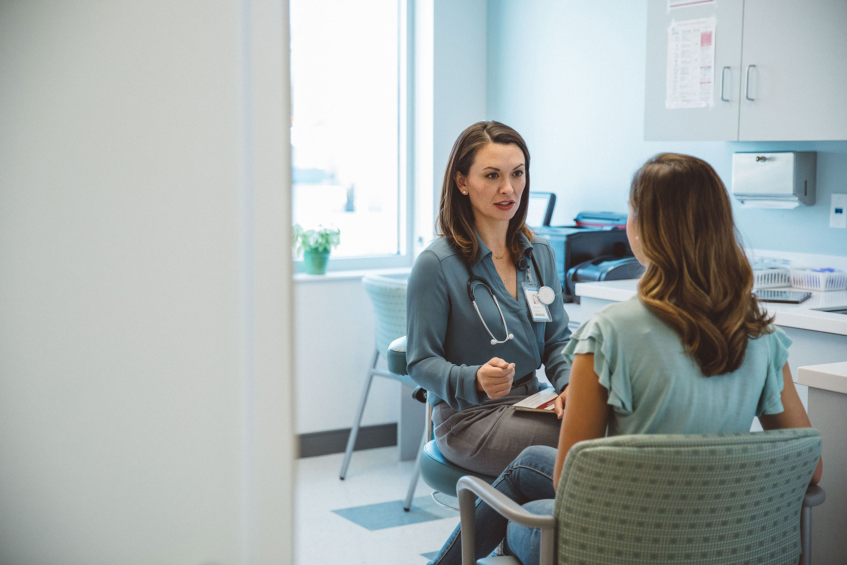 Doctor in discussion with a patient |  Centene | John Fedele Lifestyle Photography