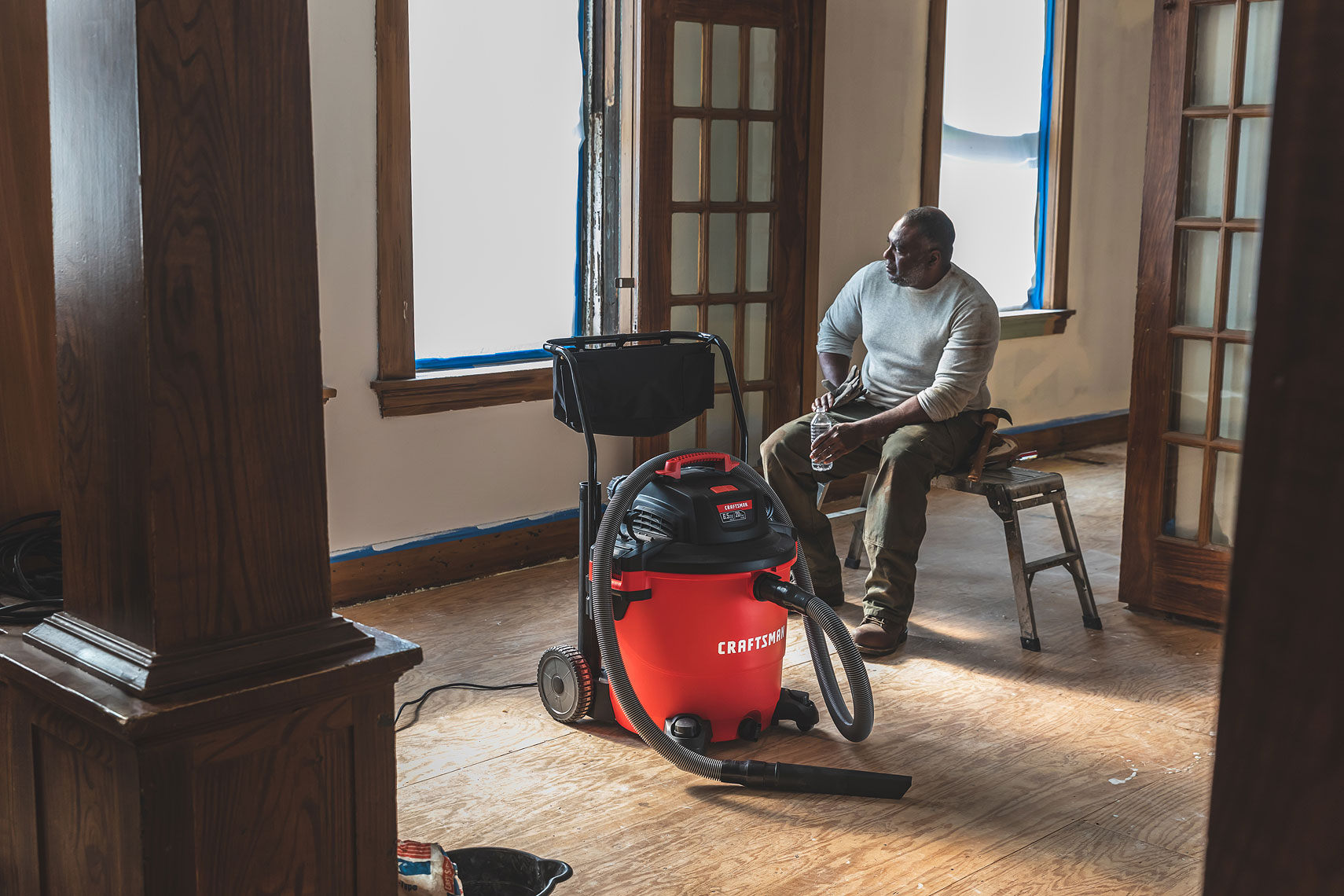 Craftsman Tools 20 Gallon Wet/Dry Vacuum | Man taking a break during a room remodel | John Fedele Product Photography