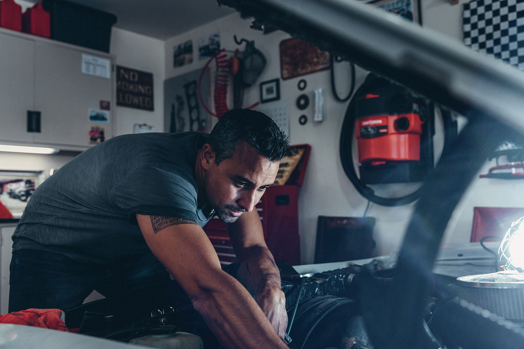 Craftsman Tools 5 Gallon Wet/Dry Vacuum | Man working on car in garage. | John Fedele Product Photography