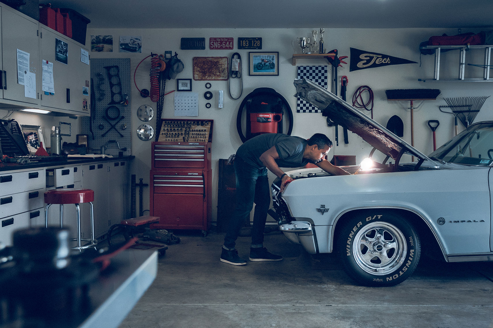 Craftsman Tools 5 Gallon Wet/Dry Vacuum | Man working on Chevy Impala in his garage.  | John Fedele Product Photography