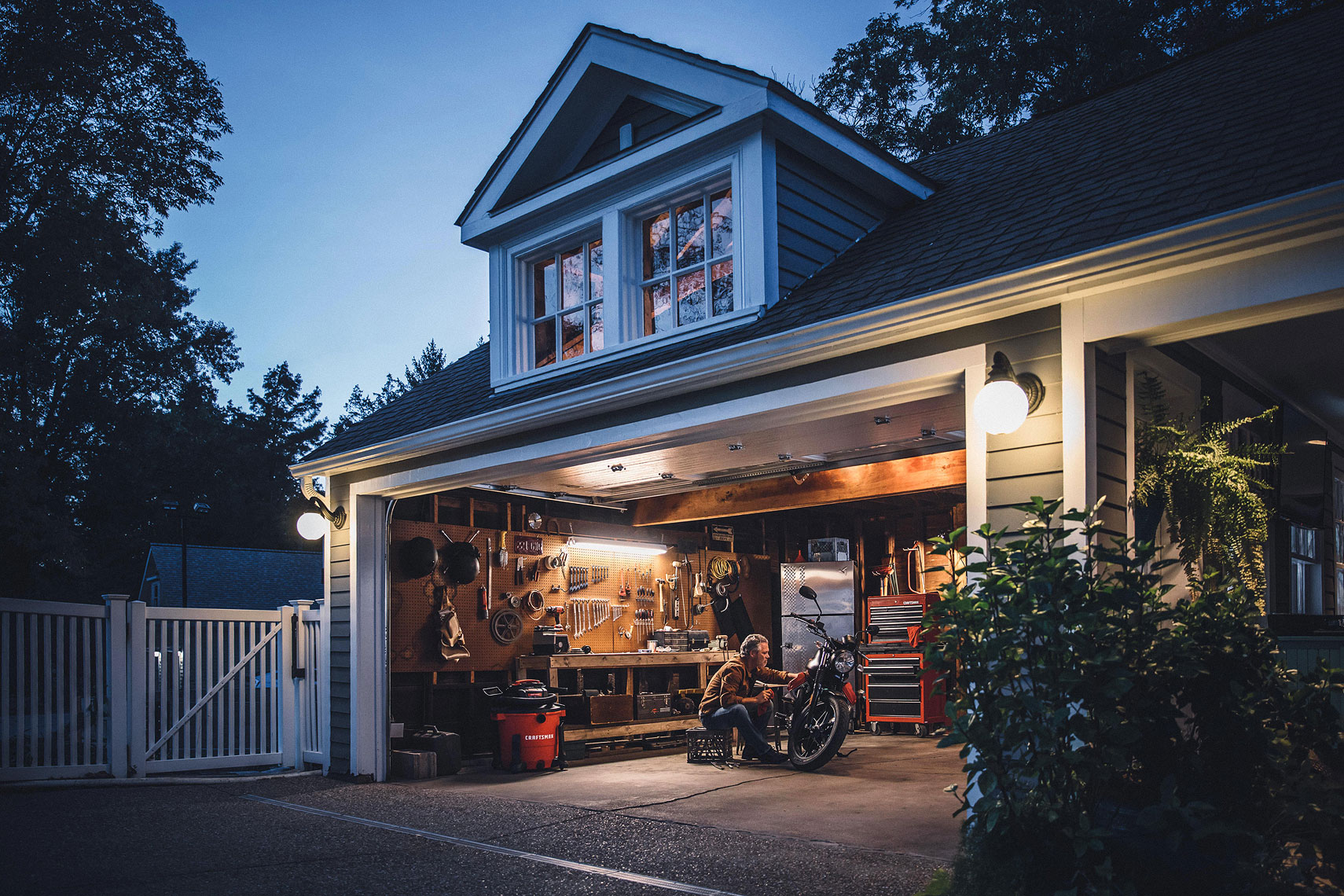 Craftsman Tools 20 Gallon Wet/Dry Vacuum | Man working on his Moto Guzzi motorcycle in his garage with Craftsman vac in the background. | John Fedele Product Photography