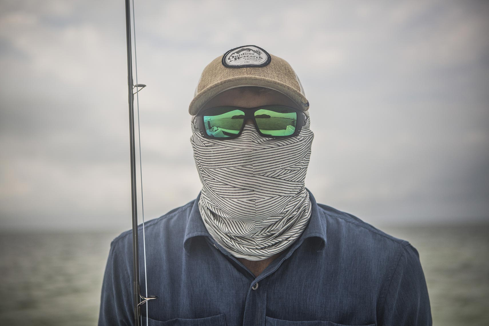 Close up of a fisherman with proper face and head attire for the open ocean  | John Fedele Lifestyle Photography